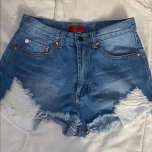 Distressed denim shorts